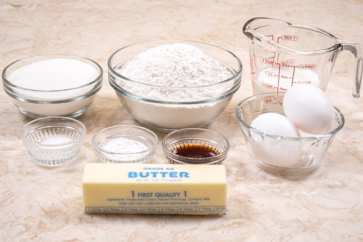 Sugar, all-purpose flour, milk, baking powder, salt, vanilla, eggs and butter make up the basic muffin mix