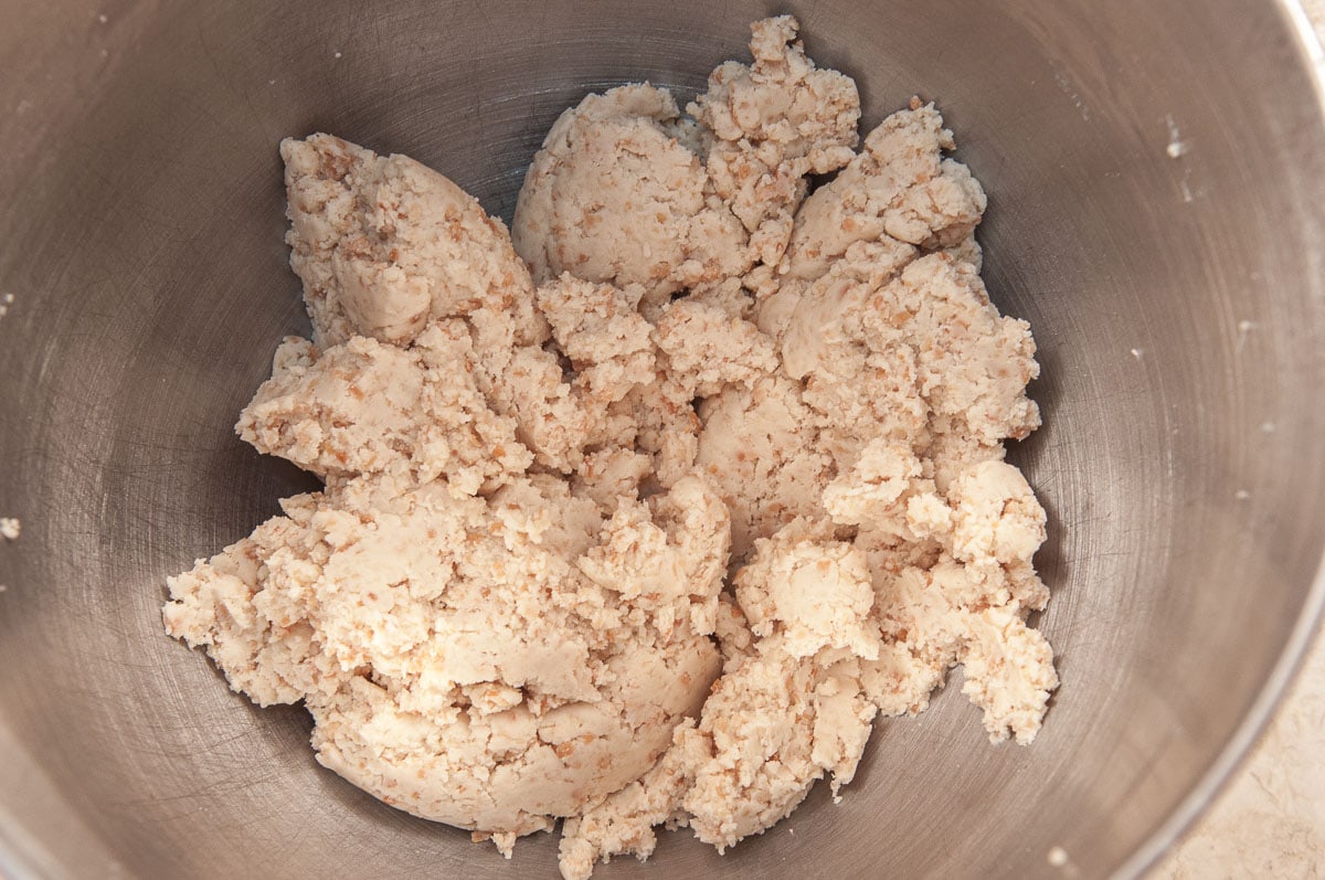 The completed dough in the bowl of the mixer