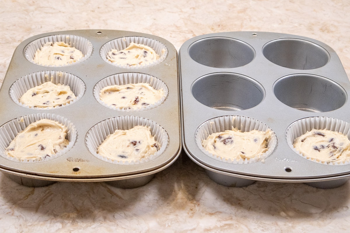 The batter is scooped into 8 paper lined Texas muffin cups.