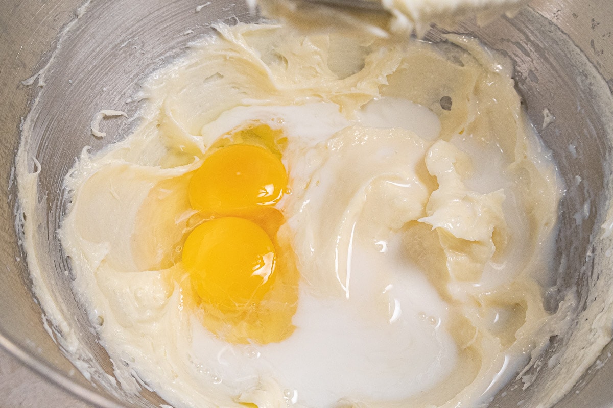 The eggs, milk and almond extract have been added to the creamed mixture.
