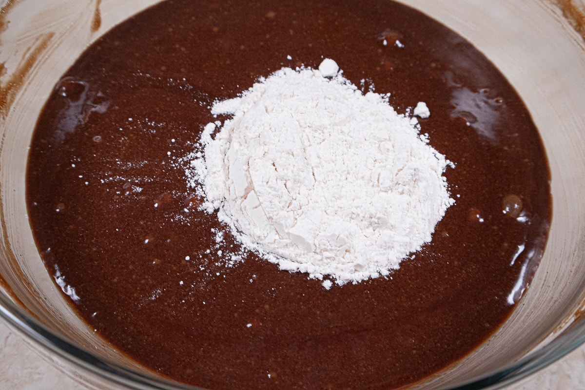 The flour is added to the chocolate mixture.