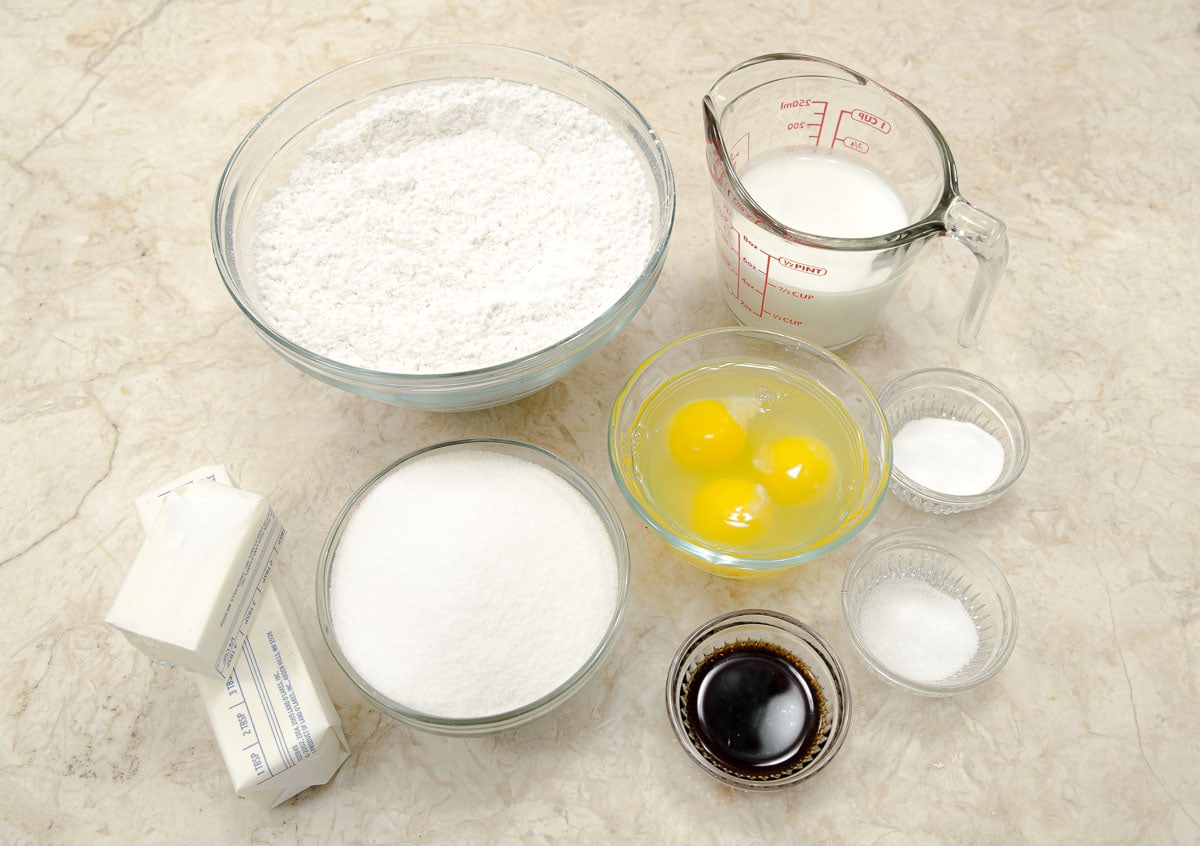 Cake ingredients include cake flour, milk, baking powder, salt, vanilla, sugar, butter, and eggs.