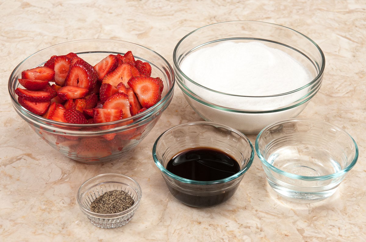 Strawberry Balsamic Jam ingredients are strawberries, sugar, black pepper, balsamic vinegar and water.