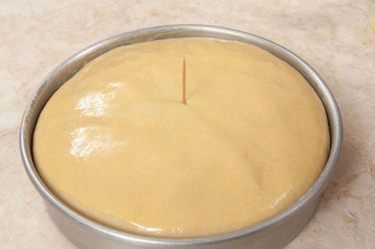 A toothpick is inserted in the center of the tart to make a hole for the steam to escape.