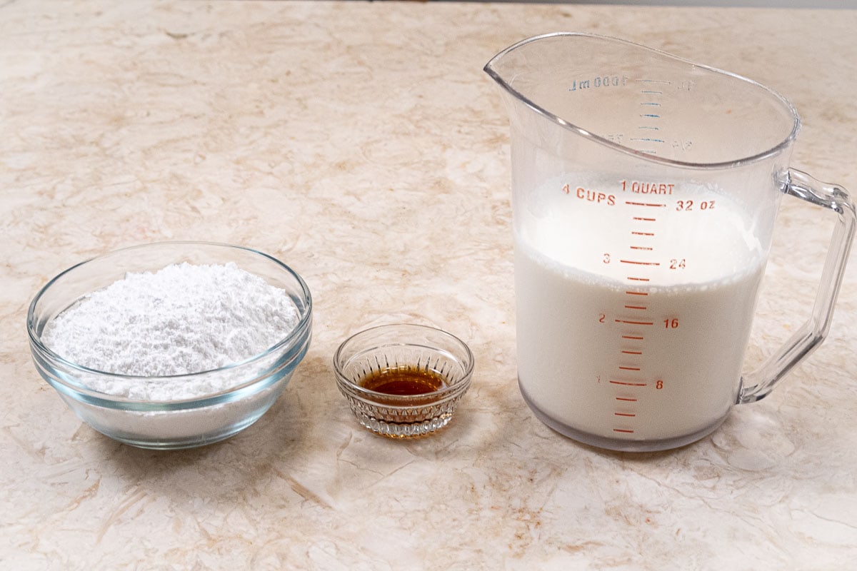 Whipped cream ingredients include powdered sugar, vanilla and heavy cream.