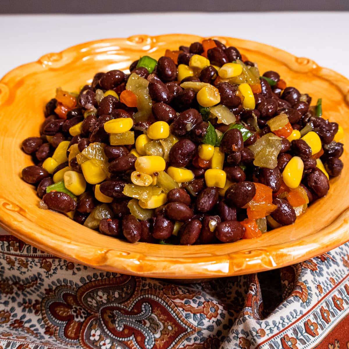 Black bean salad with black beans, corn, red peppers, green chiles in a vinagrette.