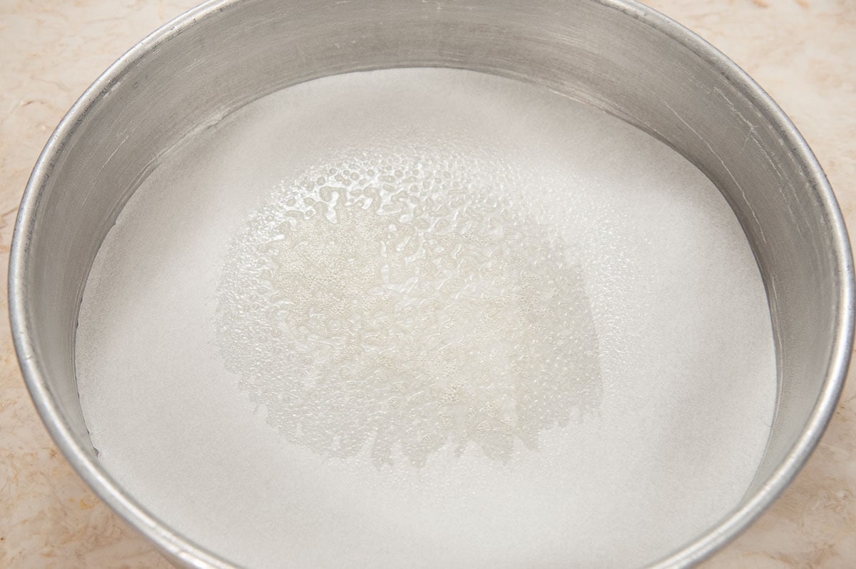 The center only of the parchment paper is sprayed with a non-stick-baking-release