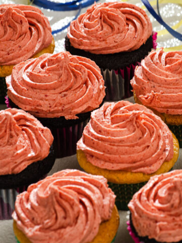 Cupcakes topped with Strawberry Buttercream.