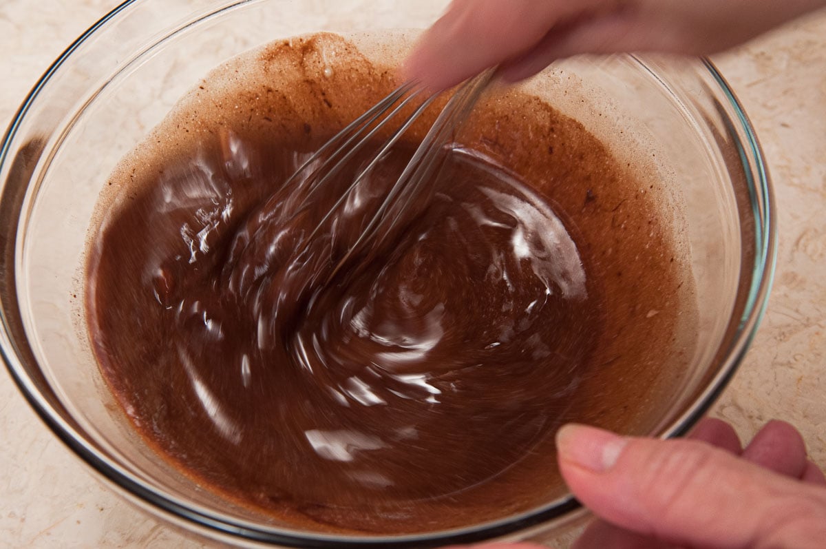 Gently whisk the chocolate and butter to combine completely. 