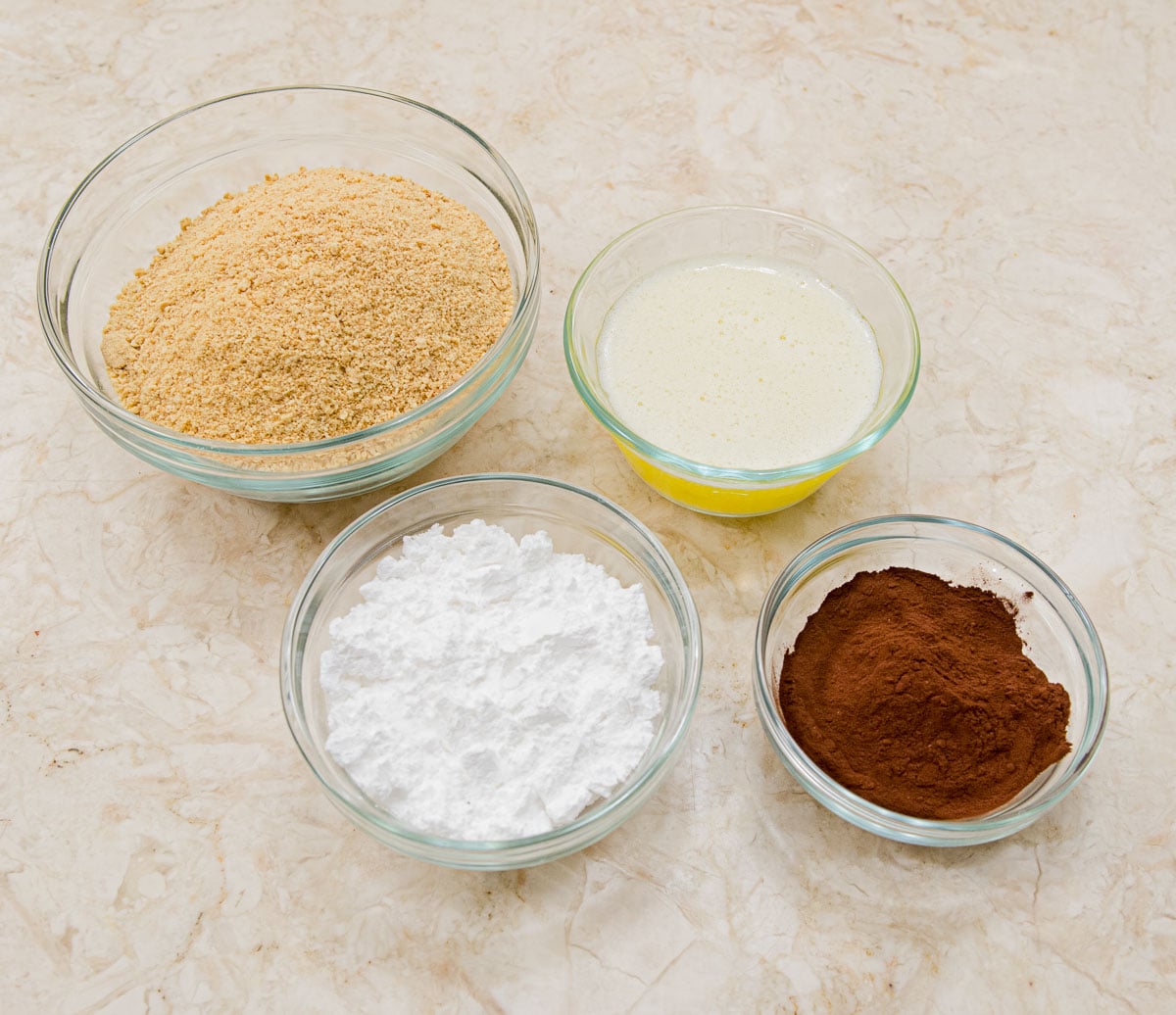 Crust ingredients are graham cracker crumbs, butter,powdered sugar and cocoa.