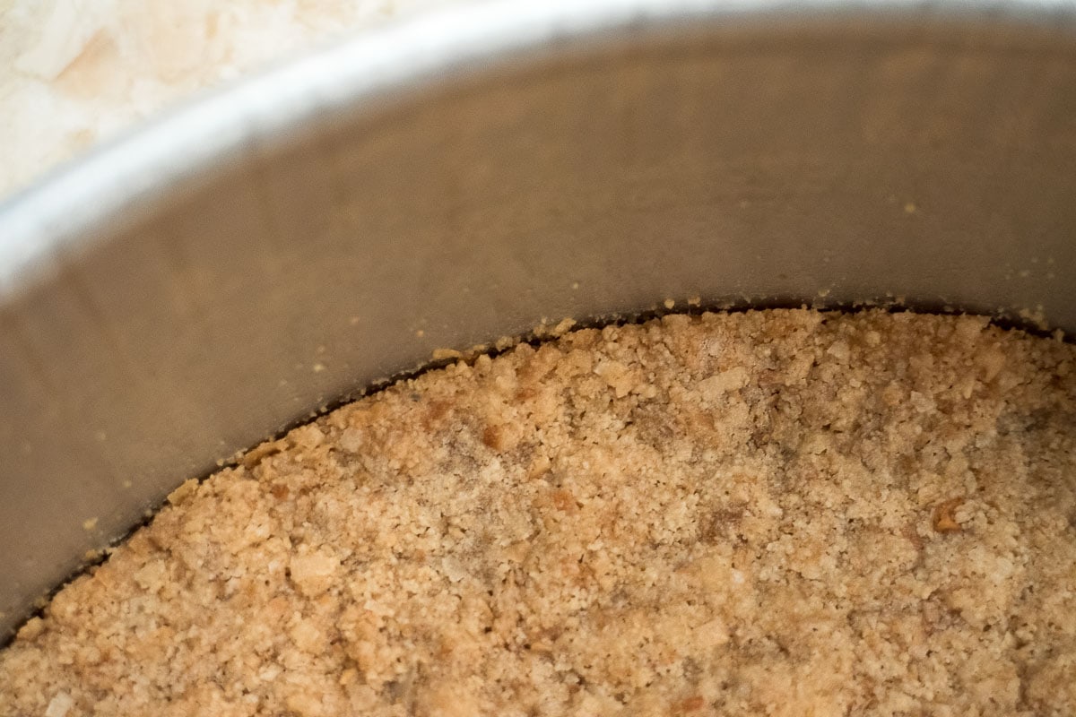 The edge of the crust has pulled away slightly from the pan.