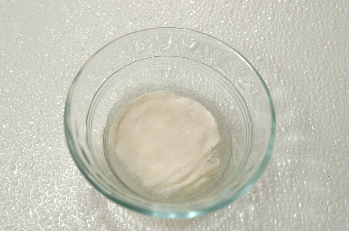 The gelatin is placed in water to soften or bloom.