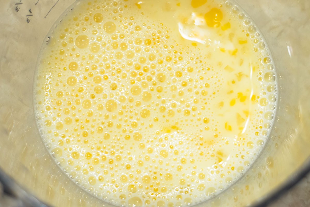 The milk and egg are whisked together.