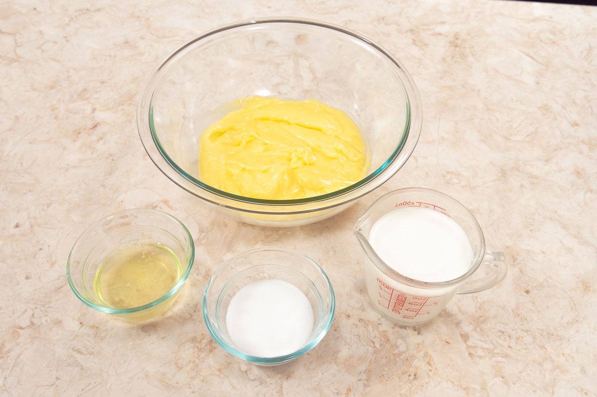 The lemon mousse ingredients include lemon curd, egg whites, granulated sugar and cream.