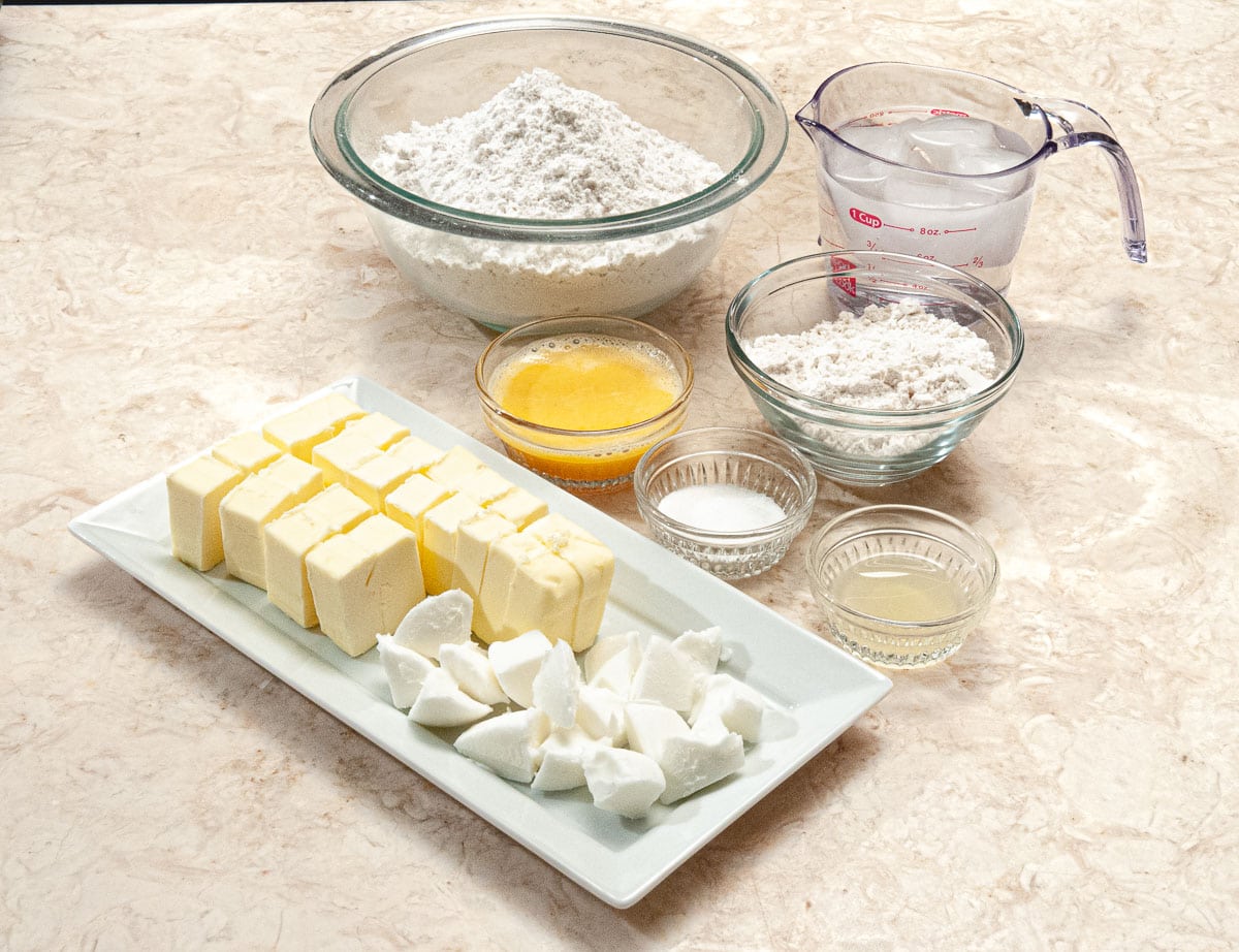 Ingredients for the pie crust include all-purpose flour, cake flour, egg, salt, butter, shortening and water. 