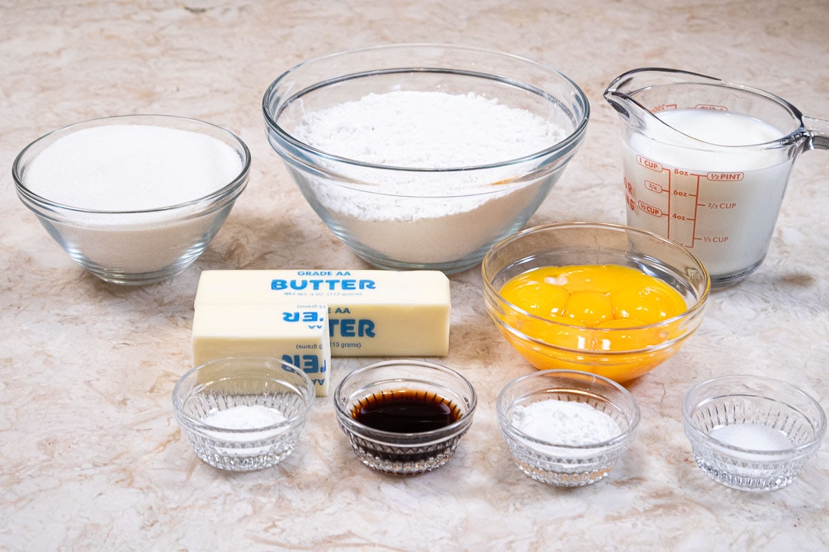 The ingredients for the Yellow Buttermilk Cake are egg yolks, buttermilk,vanilla,cake flour, granulated sugar, baking powder, baking soda, salt,and unsalted butter. 