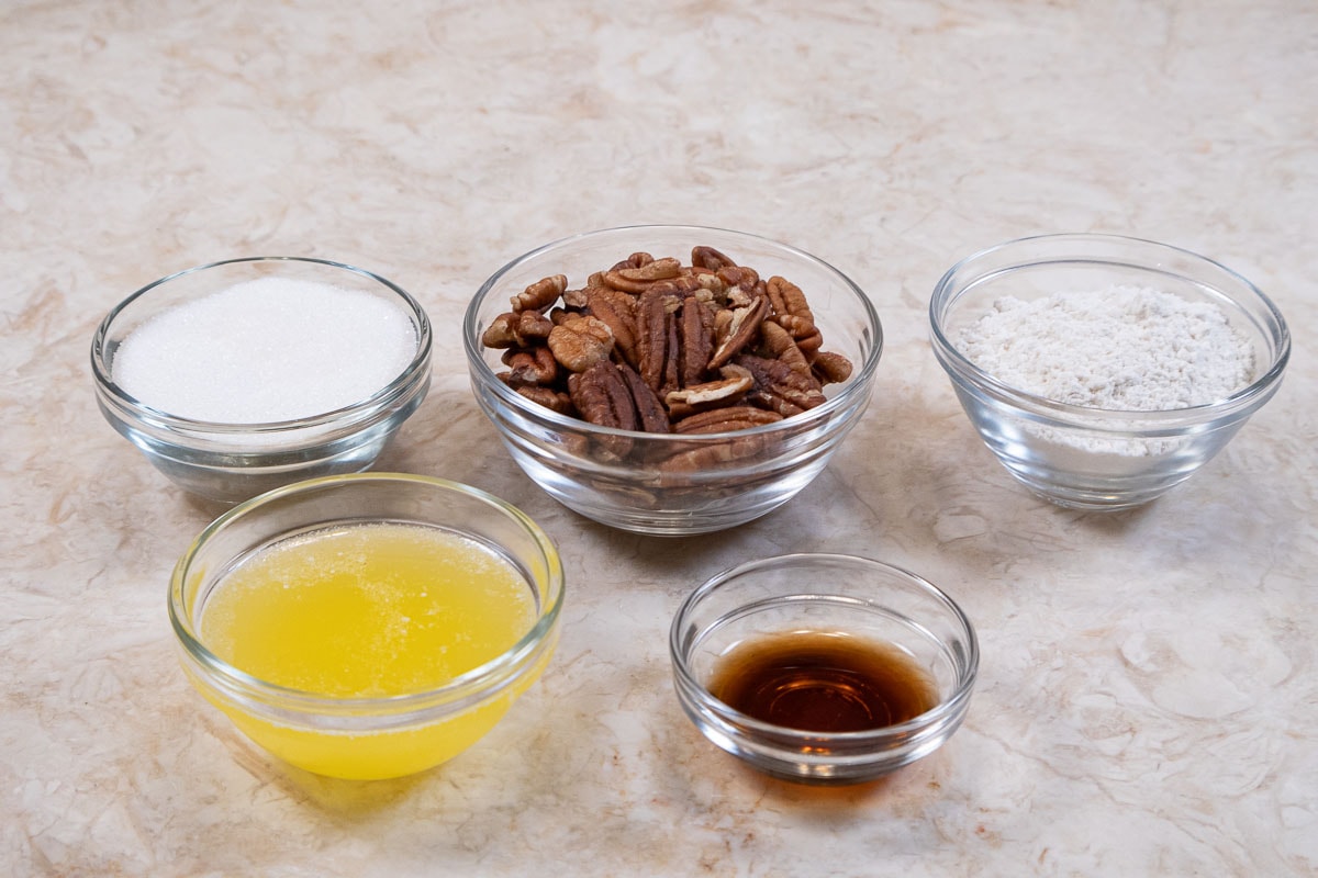 The pecan topping for the carrot cake doughnuts is made of granulated sugar, pecans, flour, melted butter and vanilla.