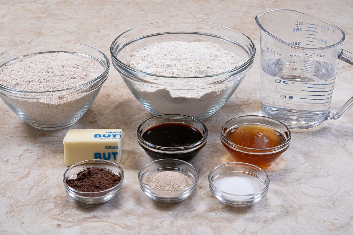 Ingredients for the bread are whole wheat flour, bread flour, water, butter, molasses, honey, cocoa ,yeast and salt.