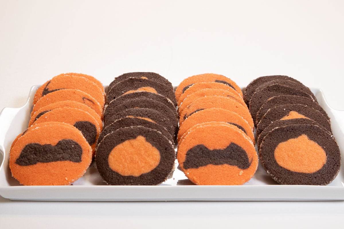 This photo shows the cookies lined up in rows on a white plate.