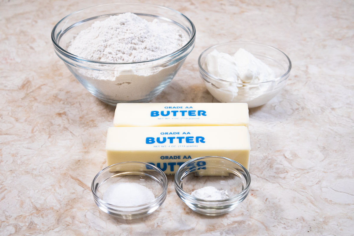 Ingredients for the pastry include bread flour, sour cream, unsalted butter, baking powder and salt.