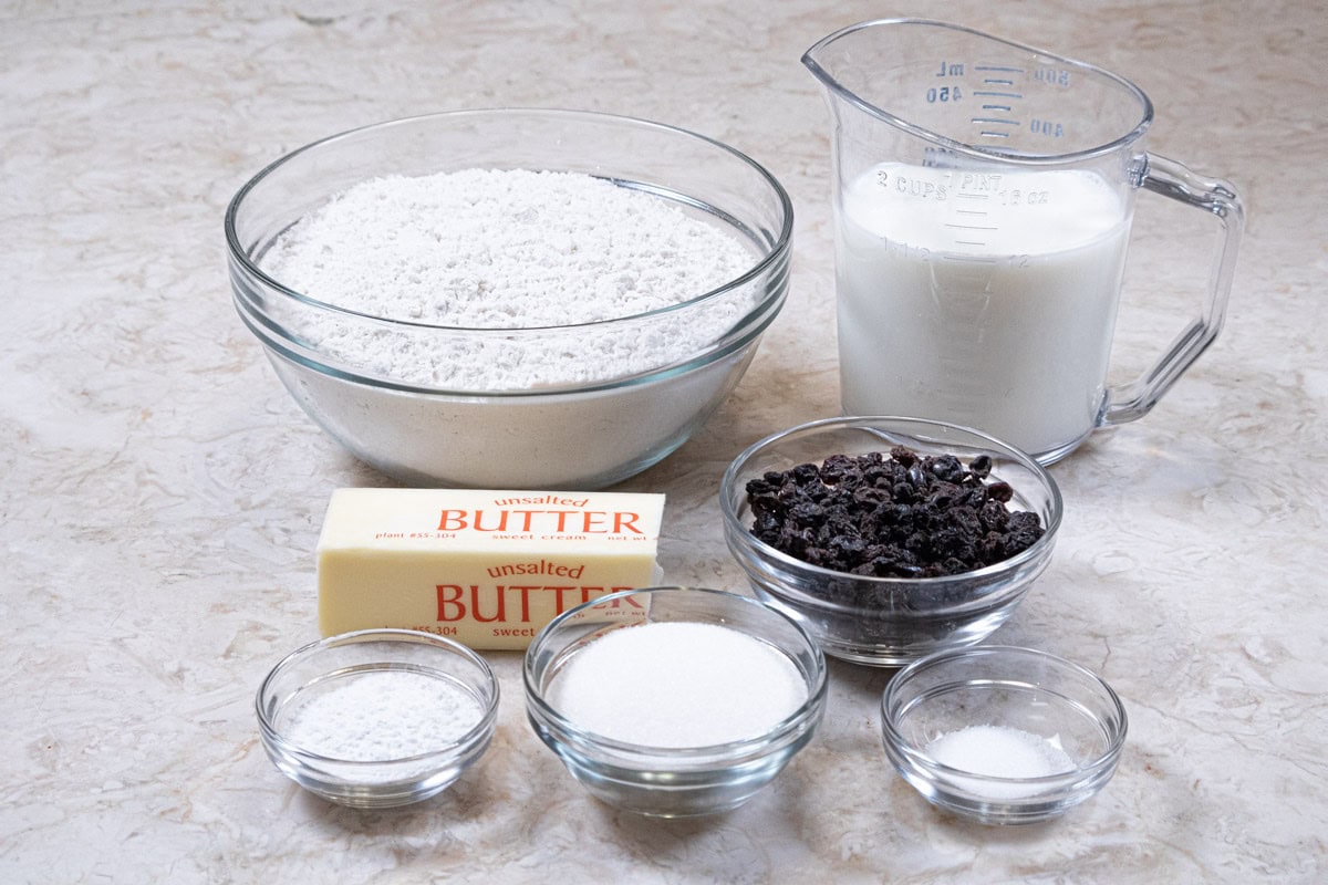 Ingredients for the scones include all-purpose flour, buttermilk, butter, currants, baking powder, sugar, and salt. 