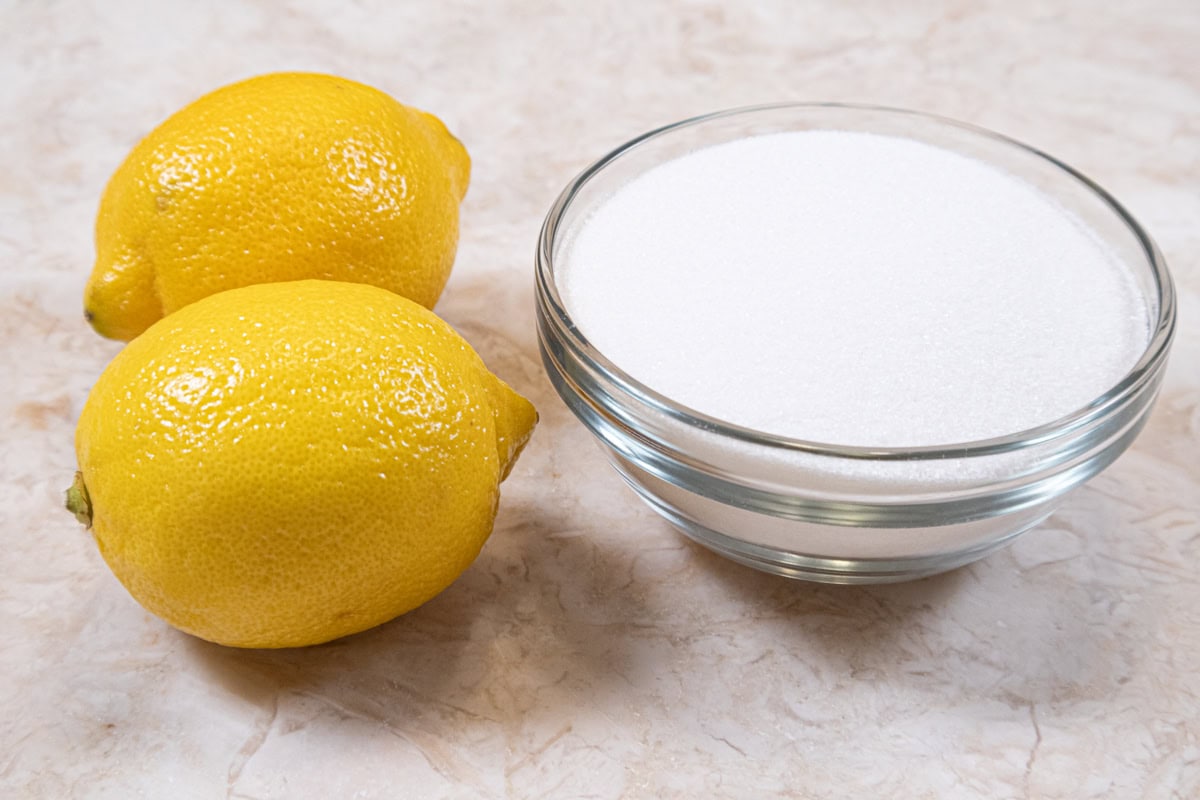 Lemon juice and granulated sugar for the Lemon Soaking Syrup