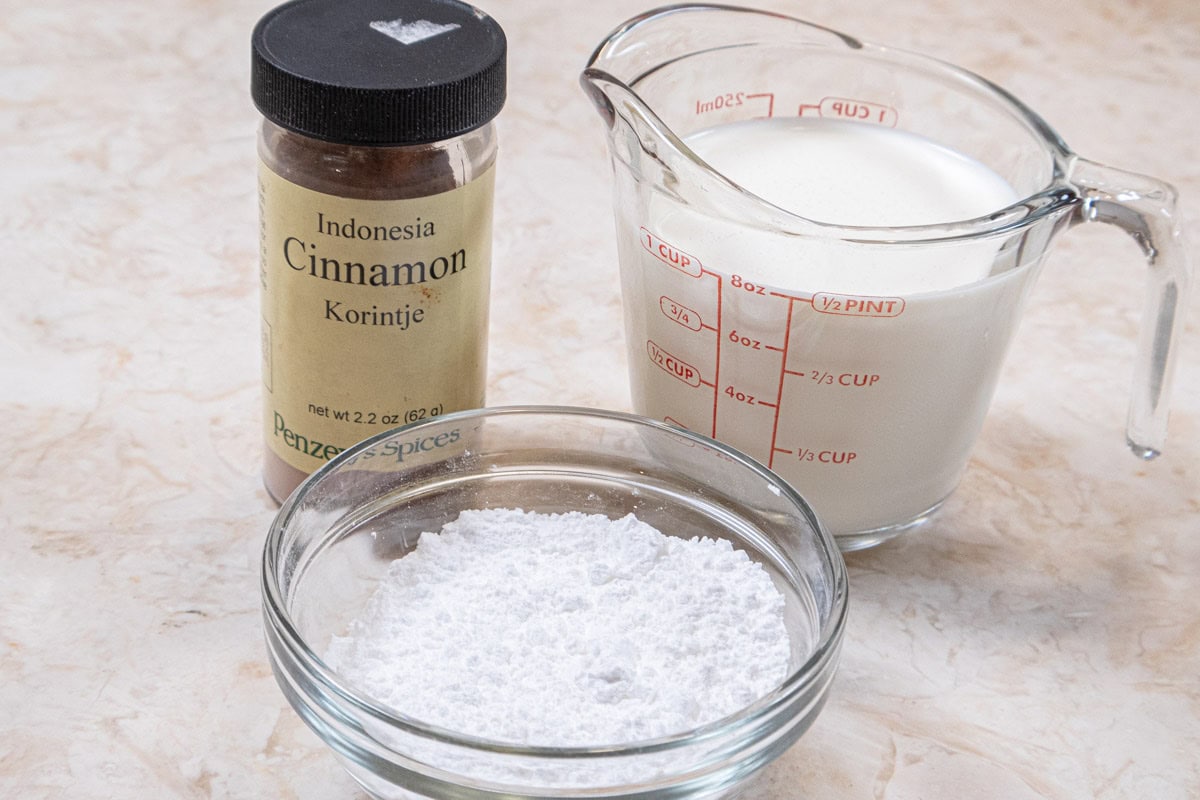 The Whipped Cream Topping includes, heavy cream, powdered sugar, and cinnamon. 