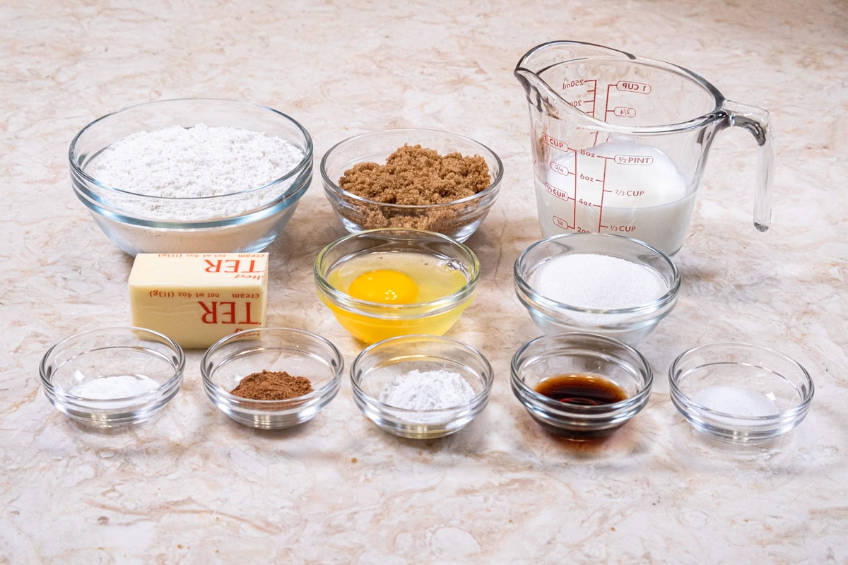 Ingredients for the Crumbed Baked Donuts Recipe include all-purpose flour, baking powder baking soda, nutmeg, salt, butter, granulated sugar, brown sugar, egg, vanilla and milk.