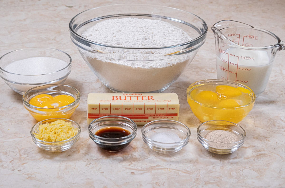 Ingredients for the Lemon Sugar buns include instant yeast, milk, unsalted butter, granulated sugar, lemon zest, vanilla, salt,eggs, egg yolks and all-purpose flour.