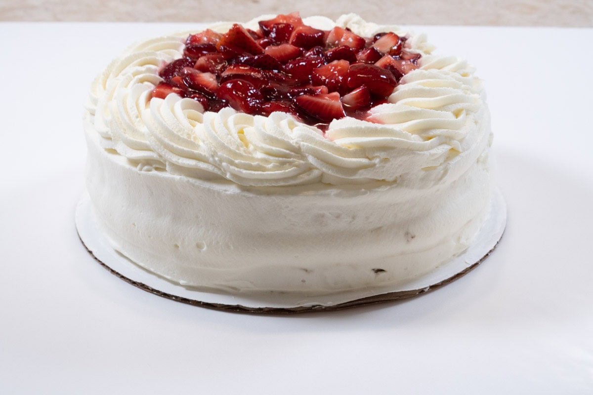 The finished cake with the divide between the layers poking out.