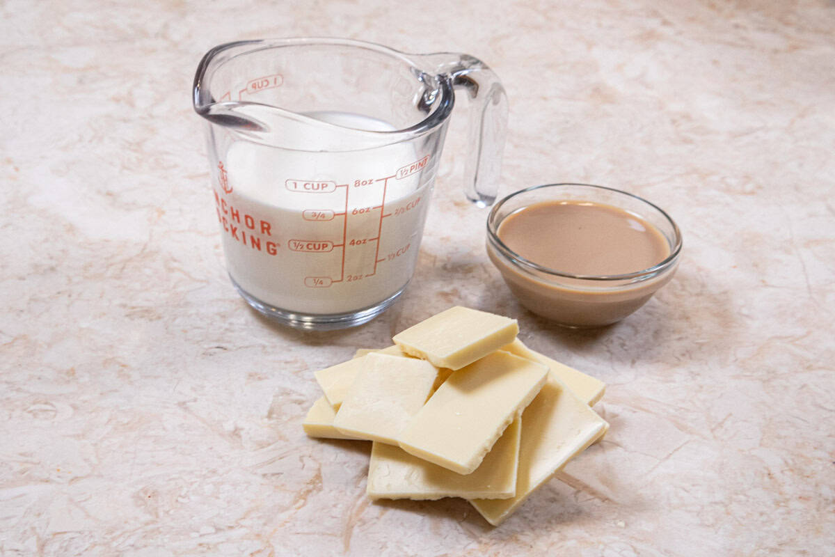 The ingredients for the white chocolate mousse are heavy cream, Bailey's liqueur, white chocolate. 