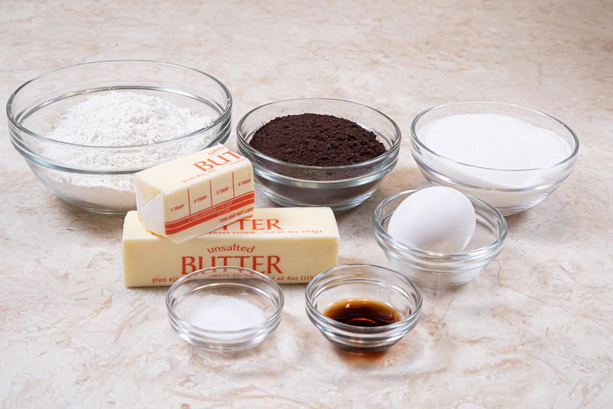 Ingredients for the Almost Oreos - Homemade Oreo Cookies are all-purpose flour, black cocoa, granulated sugar, unsalted butter, and egg, salt, and vanilla. 