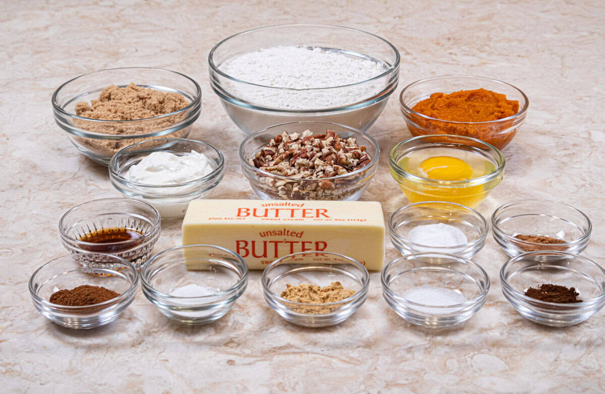 Ingredients for the Pumpkin Pecan Scone Recipe are: Pumpkin puree, an egg, sour cream, vanilla, all-purpose flour, brown sugar, baking powder, baking soda, salt, spices and butter.