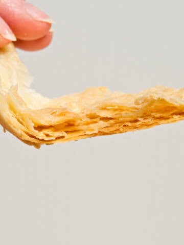 A slice of the American Pie Crust showing off it's flakiness.