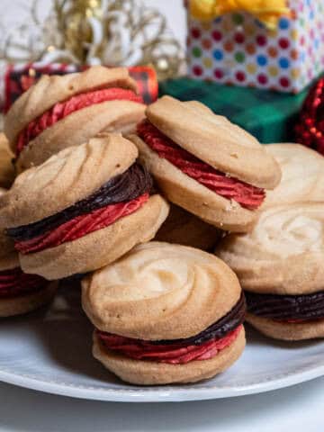 Viennese Whirl Cookies are comprised of two cookies filled with a chocolate and strawberry buttercream.