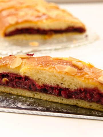 A slice of Easier Danish Pastry sits on a silver server.