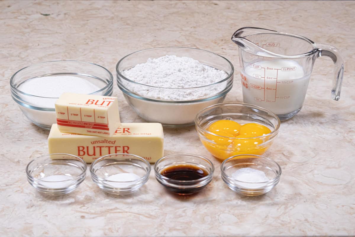 Ingredients for the Yellow Buttermilk Cake include egg yolks, buttermilk, vanilla, cake flour, granulated sugar, baking powder, baking soda, salt and unsalted butter.