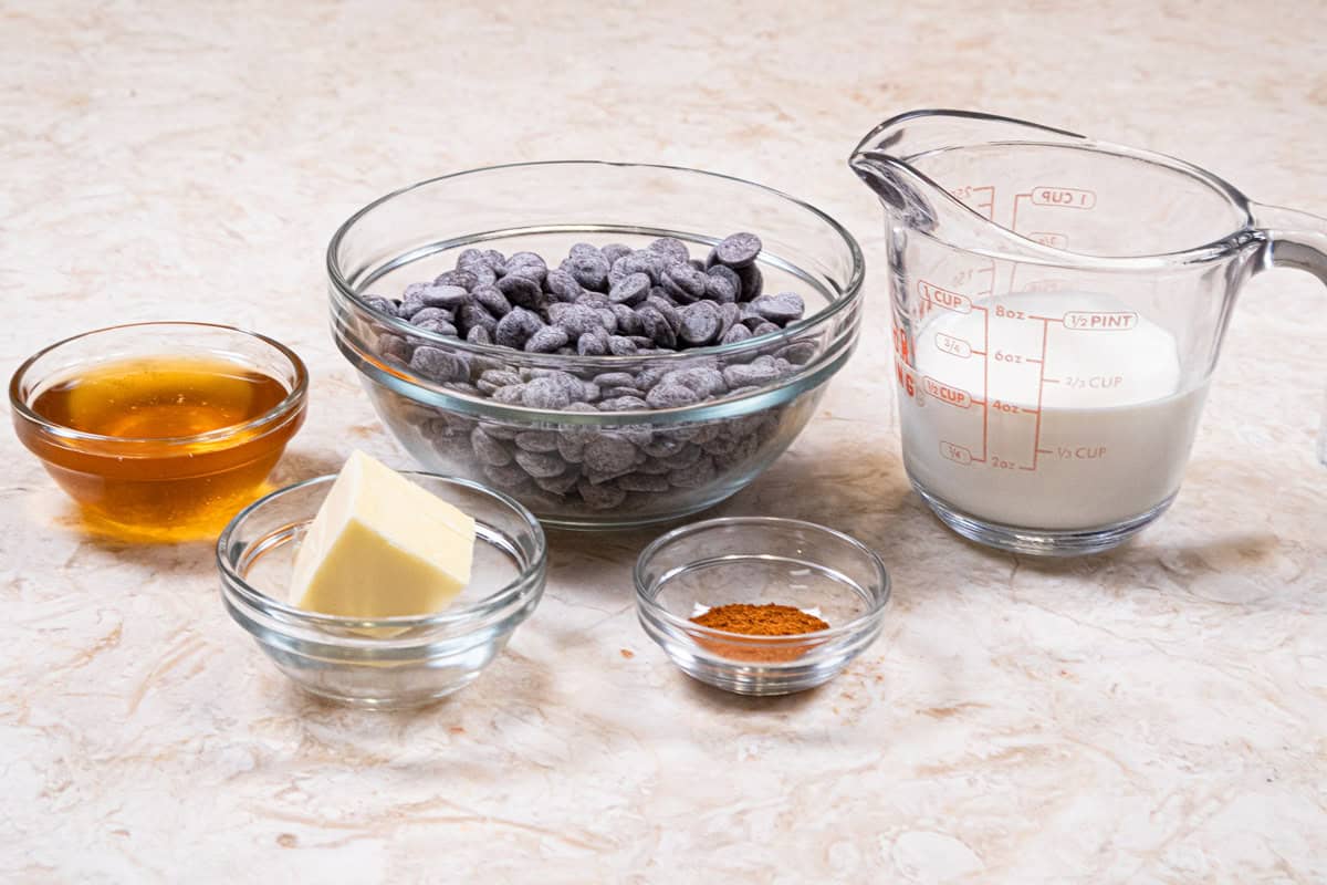 Hot honey ganache ingredients include honey, chocolate, heavy cream, butter and cayenne pepper.