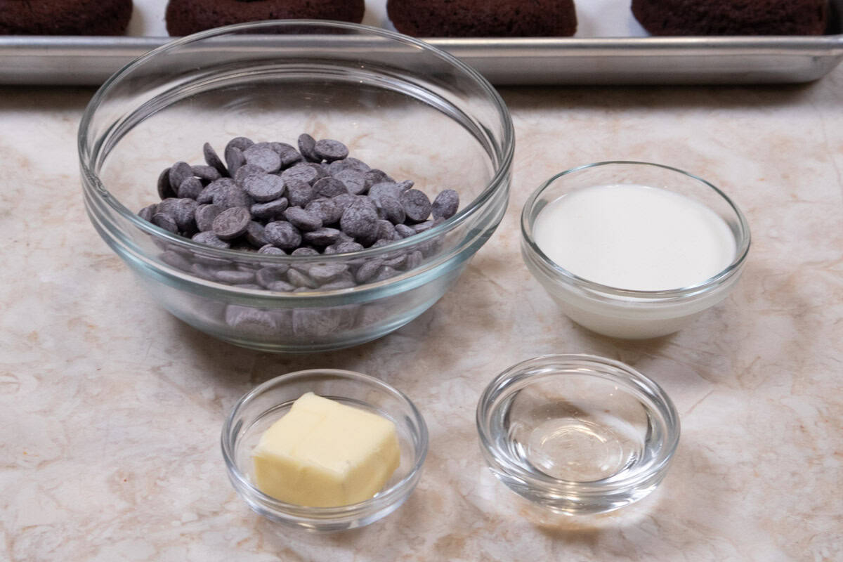The Chocolate Glaze ingredients include unsalted butter, corn syrup, semisweet chocolate, heavy cream.