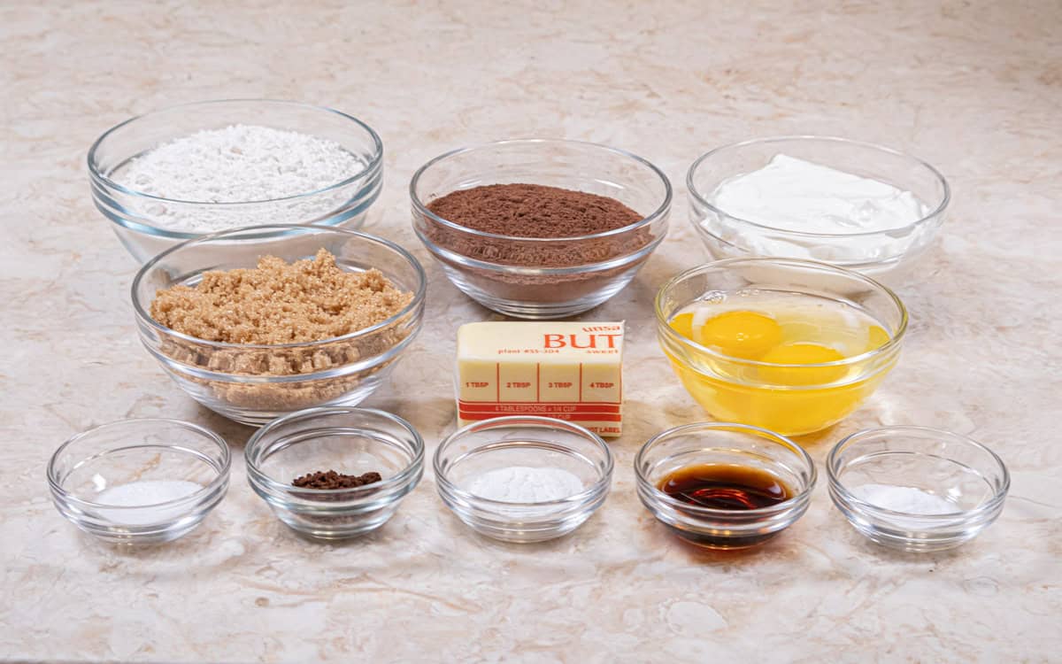 Ingredients for the Chocolate Cake Donuts are: all-purpose flour, cocoa, baking soda, baking powder, brown sugar, salt, unsalted butter, eggs, vanilla, and sour cream