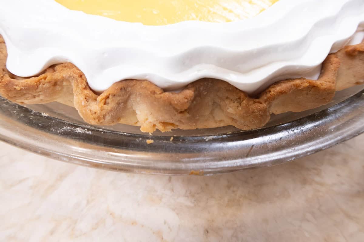 This picture shows the meringue touching the inside of the crust in a close-up