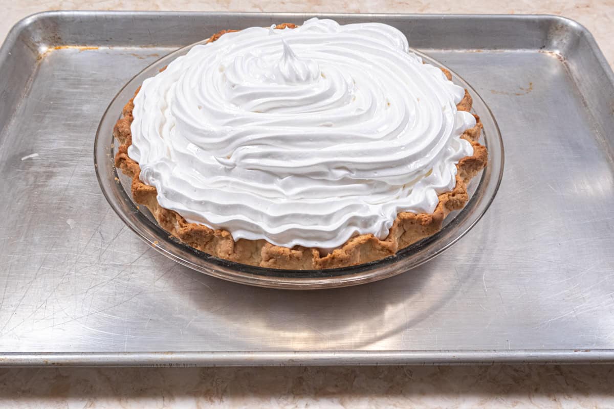 The Lemon Meringue Poe is placed on a rimmed baking tray.