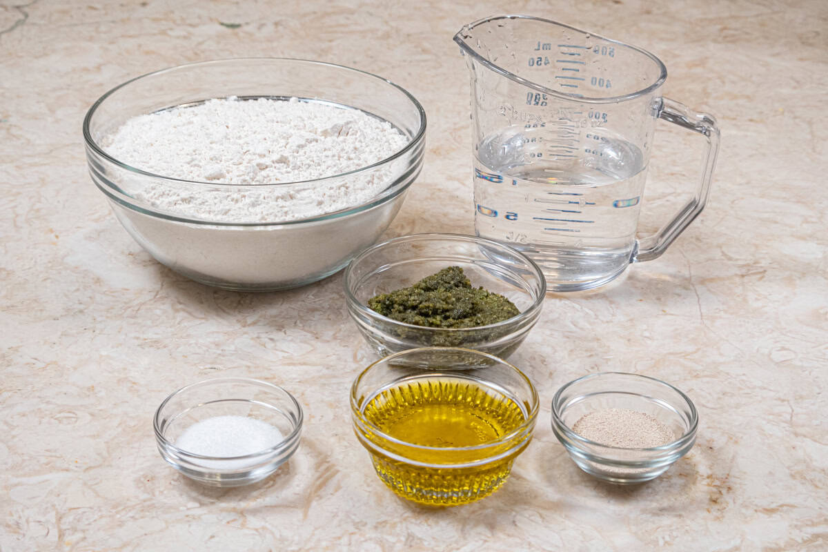 Ingredients for the Lemon Pepper Focaccia are bread flour, instanat yeast, salt, zippy olive oil, water, lemon pepper pesto.