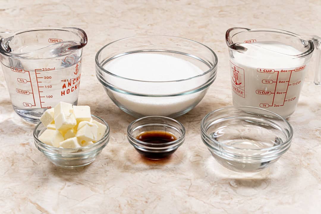 Ingredients for the caramel are water, granulated sugar, heavy cream, unsalted butter, vanilla and corn syrup.