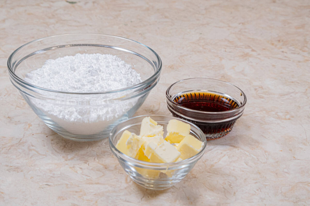 The ingredients for the maple glaze are powdered sugar, pure maple syrup, and unsalted butter.