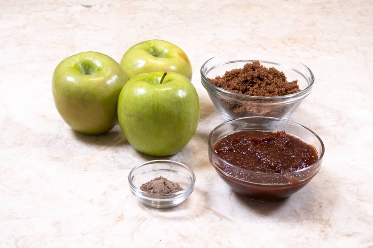 Ingredients for the apple filling are Granny Smith apples, brown sugar, apple butter, shredded apples, cardamom