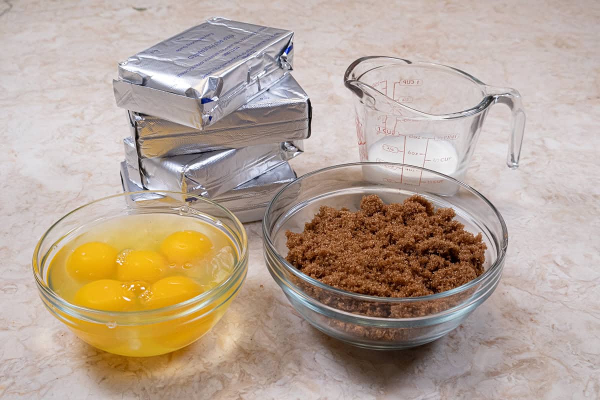 The cheesecake ingredients include  cream cheese, brown sugar, eggs, and heavy cream.